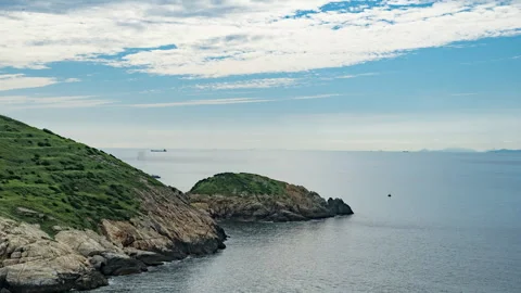 Time Lapse of Cloud Movement Over Scenic Island Landscape Stock Footage 319999203