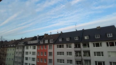 Time lapse of cloud movement in a residential area of Düsseldorf Stock Footage 157942318