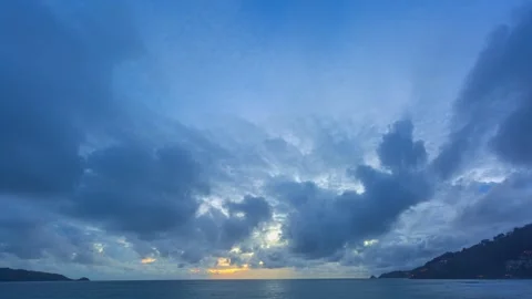 Time lapse cloud moving above the sea at colorful sky of sunset..Imagine the  Stock Footage 247621638