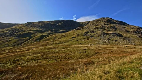 Time lapse of cloud rolling over Mountain scene. Stock Footage 118387866