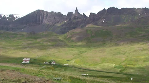 Time Lapse cloud shadows on Glacial valley with farm Stock Footage 37319785