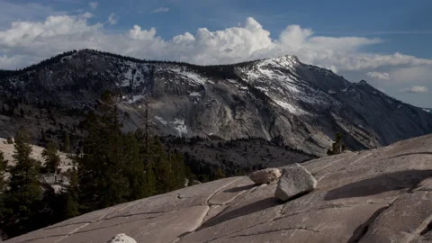 Time lapse of cloud shadows on glaciated landscape at Olmsted Point in Yosemite Stock Footage 148245219