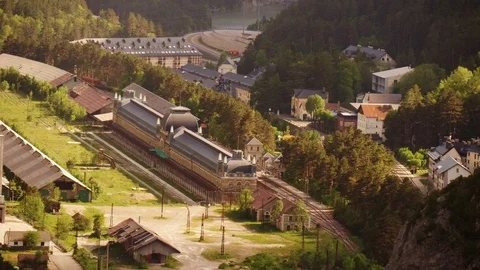 Time-lapse  with cloud shadows rolling over the Canfranc railway station Stock Footage 98185880