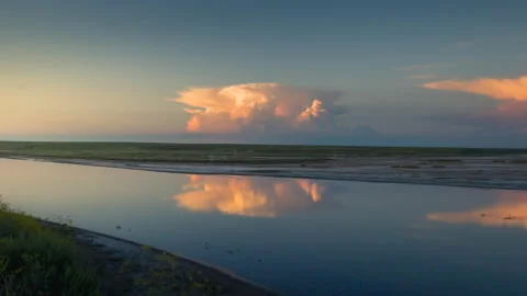 Time lapse of a cloud at Sunset. Stock Footage 167610462