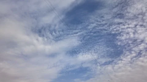 Time lapse clouds 4k rolling puffy cumulus cloud relaxation weather dramatic Video stock 297682210