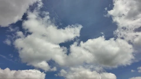 Time lapse clouds 4k rolling puffy cumulus cloud relaxation weather Video stock 308616228