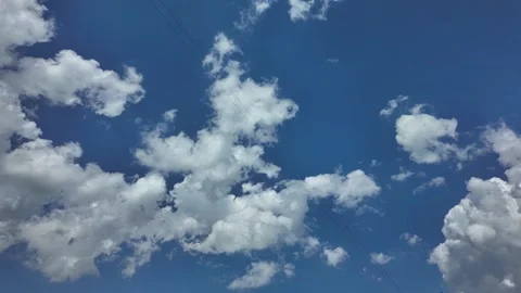 Time lapse clouds 4k rolling puffy cumulus cloud relaxation weather dramatic Stock Footage 336689663