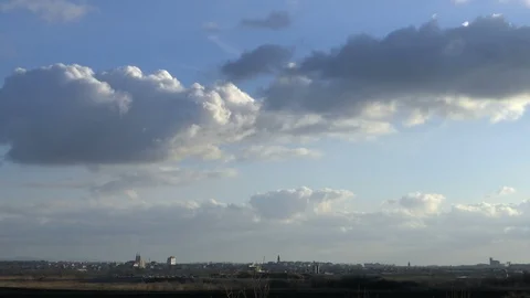 Time lapse of a clouds above the city Stock Footage 123858394