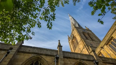 Time lapse of clouds above 'Crooked Spire' , Chesterfield, Derbyshire, England Stock Footage 280717524
