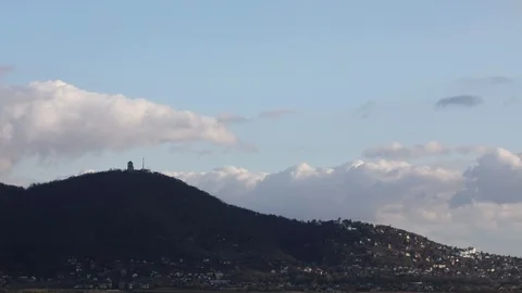 Time lapse clouds above the hill Stock Footage 123863666