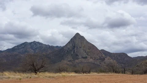 Time lapse of clouds above iconic mountains in southern Arizona Stock Footage 236068305