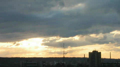 Time-lapse of clouds above industrial area at sunset 1 Stock Footage 109364