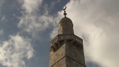 Time-lapse of clouds above Minaret tower in Jerusalem Stock Footage 86759424