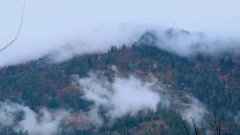 Time lapse of clouds above the mountains during the winter at Manali in Himachal Stock Footage 168291218