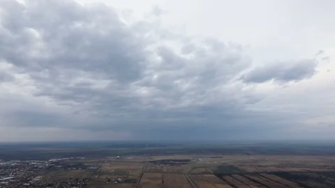 TIME LAPSE OF a clouds above the plain and agricultural fields Stock Footage 125445003