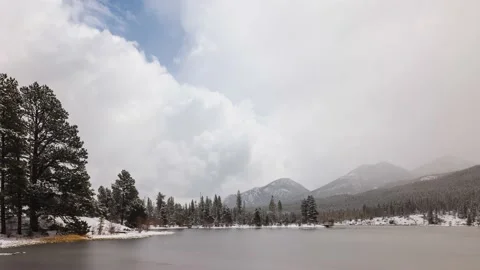 Time Lapse of clouds above the Rocky Mountains 動画素材 210503775