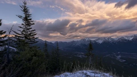 Time lapse of clouds above snowy mountain peaks Stock Footage 85409121