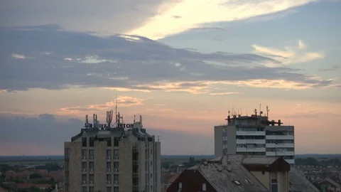 Time lapse  the clouds above two buildings Stock Footage 93273007