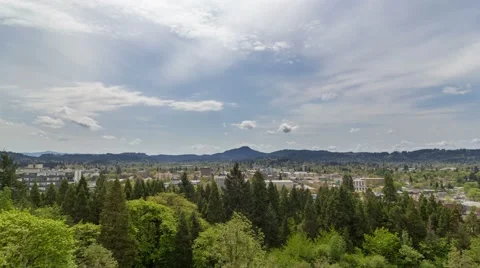 Time lapse of clouds and blue sky over cityscape of Eugene Oregon spring 4k Stock Footage 62272477