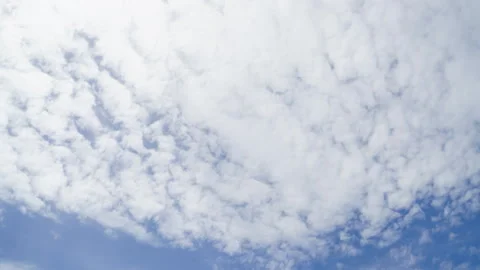 Time lapse  clouds and blue sunny sky,  white clouds over blue sky, Aerial .. Video stock 290978115