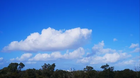 Time lapse of clouds and a city skyline Stock Footage 92168664