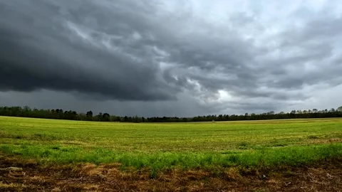 Time-lapse clouds and colorful land in the country on a stormy cloudy day 库存影片 176078760