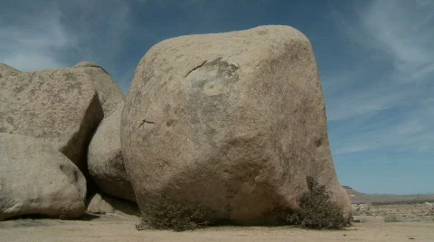 Time Lapse of Clouds and Desert Rocks - Clip 2 Stock Footage 716859