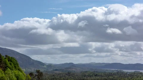 Time lapse of clouds and forest Stock Footage 43156270