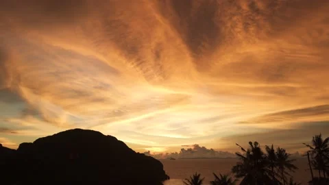 Time lapse clouds and golden sunset sky at point view Phi Phi island Stock Footage 145630289