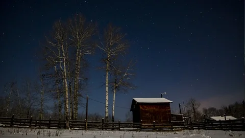 Time lapse of clouds and heavy hoar frost developing on an old farm yard during Video stock 93283937
