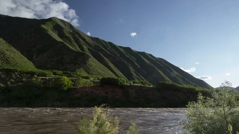 Time lapse of clouds and high water on the Colorado River Stock Footage 112291168