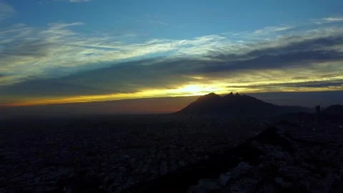 Time lapse of Clouds and Iconic Mountain Silhouette during Sunrise Video stock 263383243