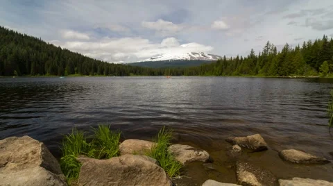 Time lapse of clouds and kayaking in Trillium Lake Clackamas County Oregon 4k Stock Footage 63643112