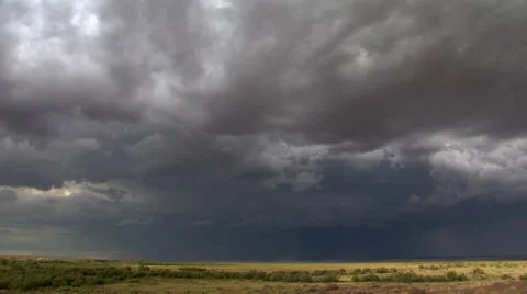 Time-lapse clouds and lightning over prairie horizon Stock Footage 59526299