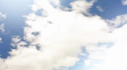 Time lapse clouds and moon running across the blue sky Stock Footage 33978013