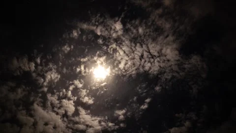 Time lapse of clouds and a moon halo Stock Footage 301581923