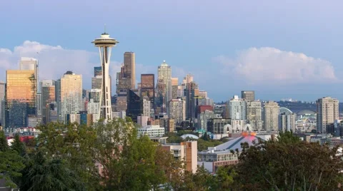 Time lapse of clouds and night lights over Seattle WA from sunset into night 4k Stock Footage 67861485