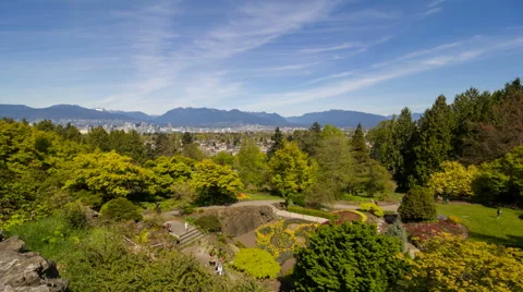 Time Lapse of Clouds and People in Queen Elizabeth Park in Vancouver BC Canada Video stock 49510126