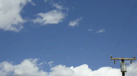 Time-lapse of clouds and power line Stock Footage 737939