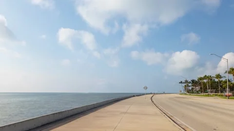 Time lapse of clouds and sidewalk on Key West Florida 動画素材 244625471