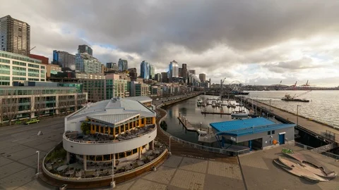 Time lapse of clouds and sky over downtown and waterfront pier in Seattle WA 4k Stock Footage 101362721