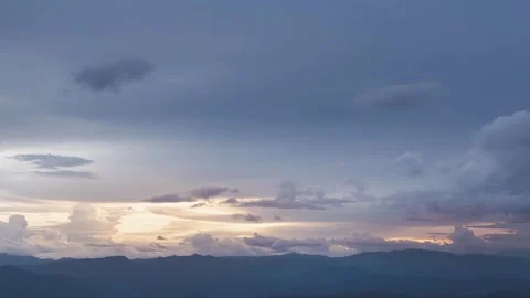 Time lapse of Clouds and sky over mountain in evening sunset. Stock Footage 251190193