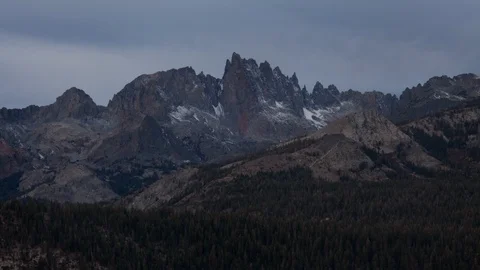 Time lapse of clouds and snowy Minarets peaks in the Sierra Nevada mountains Stock Footage 114657556