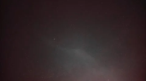 Time lapse of clouds and stars passing overhead at night Видео 53038292