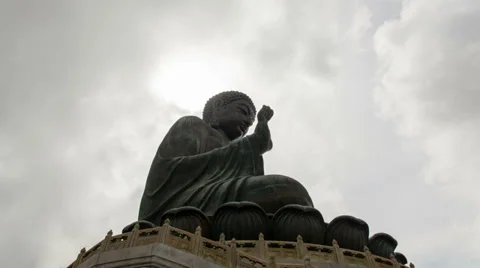 Time lapse of clouds and sunrays over Tian Tan Big Buddha in Hong Kong 1080p Stock Footage 39772604