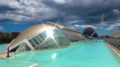 Time lapse of clouds and sunrays over the Ciutat de les Arts in Valencia 20X Stock Footage 106835564