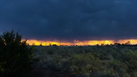 Time lapse of clouds and sunrise colors during a morning rain storm Stock Footage 277546704