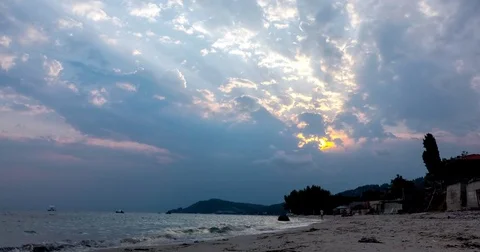 Time lapse of clouds and sunset in the coast of sea Stock Footage 81284415