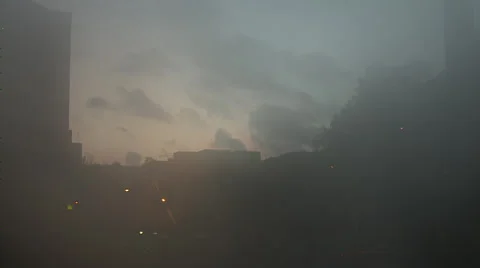 Time Lapse of clouds and traffic rolling by at Singapore apartments Video stock 35408111