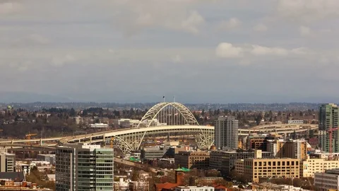 Time lapse of clouds and traffic in city of Portland OR with Fremont Bridge 4k Stock Footage 73434942